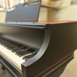 1937 Wurlitzer Butterfly Grand Piano in Matte Ebony with Red Accents