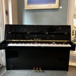 2022 Kawai Upright Model K-15E in a Polished Ebony Finish.