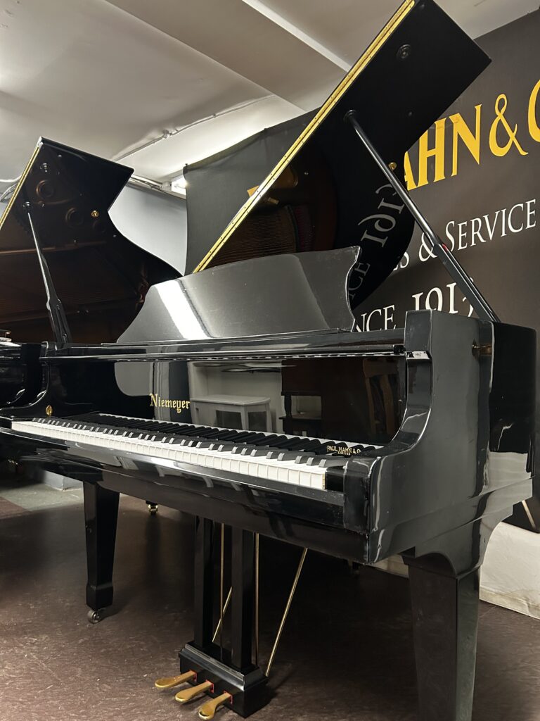 2002 Niemeyer Grand Piano Model 152C in a Poly Black Finish