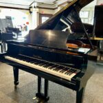 2006 Pearl River Grand Piano Model GP150 in a Polished Ebony Finish