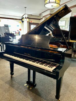2006 Pearl River Grand Piano Model GP150 in a Polished Ebony Finish