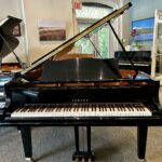 2003 Yamaha Grand Piano Model GC1 in a polished ebony finish.