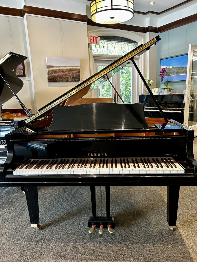 2003 Yamaha Grand Piano Model GC1 in a polished ebony finish.
