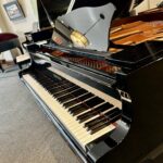 2003 Yamaha Grand Piano Model GC1 in a polished ebony finish.