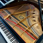 2003 Yamaha Grand Piano Model GC1 in a polished ebony finish.